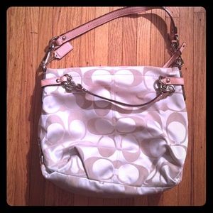 Pink and champagne coach purse